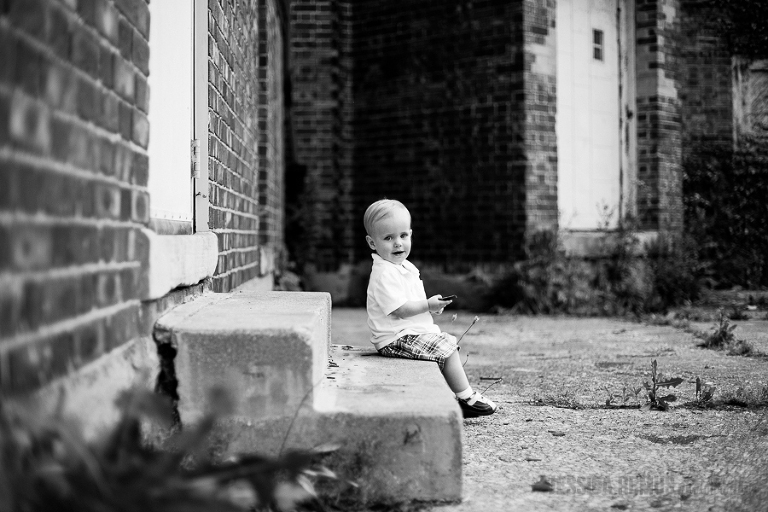 baby boy photographed near building on Belle Isle Detroit 