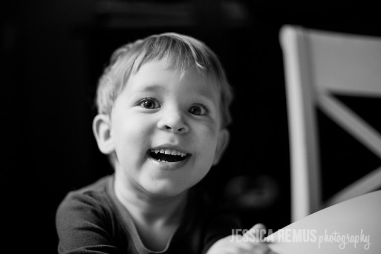 toddler boy happy inside photo