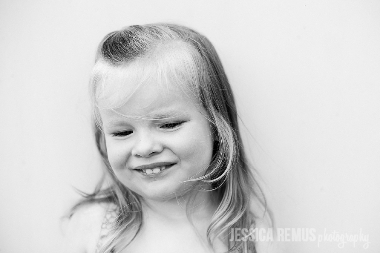 toddler girl headshot black and white