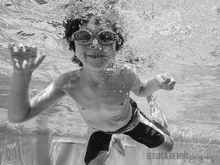 boy swimming underwater florida