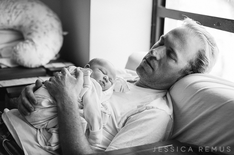 dad and infant girl sleeping hospital room chicago area